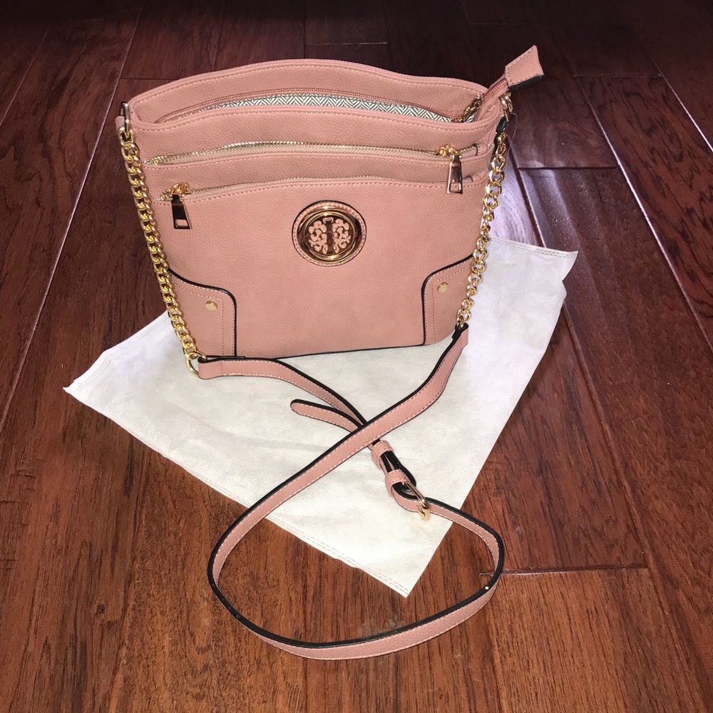 Mueve pink crossbody bag.